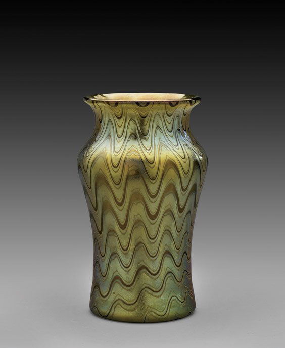 LOETZ IRIDESCENT GLASS VASE: 藝術玻璃瓶 LOETZ IRIDESCENT GLASS VASEBohemian art glass vase by Loetz; the golden iridescent form of somewhat baluster form with wide mouth; signed; H: 5 3/8"