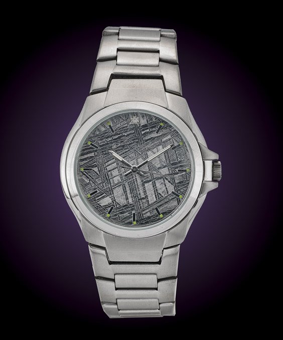 GENTLEMAN'S METEORITE WATCH: GENTLEMAN'S METEORITE WATCHAn extremely handsome timepiece, the face of this gentleman's watch has been fashioned from a slice of the famous Gibeon meteorite of Namibia, etched and polished to reveal