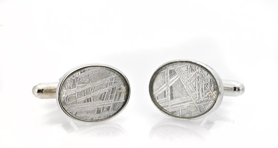 METEORITE CUFFLINKS: METEORITE CUFFLINKSLiterally out of this world jewelry for the discerning gentleman, the oval faces of these distinctive cufflinks are made from etched sections of the Muonionalusta meteorite of north