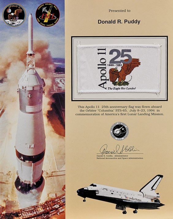 STS-65, 1994, FLOWN APOLLO 11 25th ANNIVERSARY FLAG: STS-65, 1994, FLOWN APOLLO 11 25th ANNIVERSARY FLAG Ex: Donald Puddy Estate Collection This handsome tribute to America's first lunar landing mission was presented to NASA flight director Donald Puddy