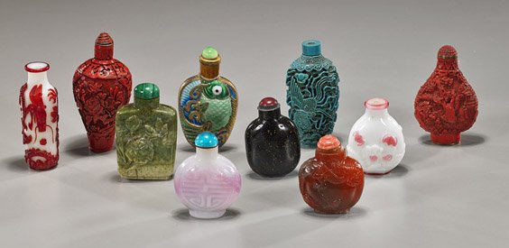 Box of 10 Various Chinese Snuff Bottles: Box of 10 Various Chinese Snuff Bottles Box of 10 Chinese snuff bottles, including: carnelian agate with dragon in relief; 2 carved overlay glass: pink on white with bat and crane, and red on white wi