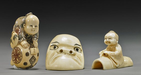 Three Various Carved Ivory Netsuke: Three Various Carved Ivory Netsuke Three carved ivory netsuke: fossil boy climbing on Daikoku's mallet, some polychrome-scrimmed detailing, signed; amusing early 20th Century boy hiding within a large