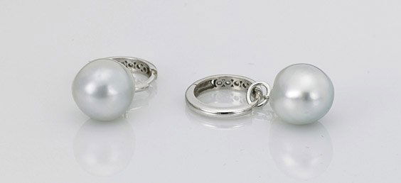 Pair Diamond & Pearl Drop Earrings: Pair Diamond & Pearl Drop EarringsPair white gold drop earrings; each set with 5 small round cut diamonds and pending a pearl of somewhat silvery coloration; L: 1" (each)