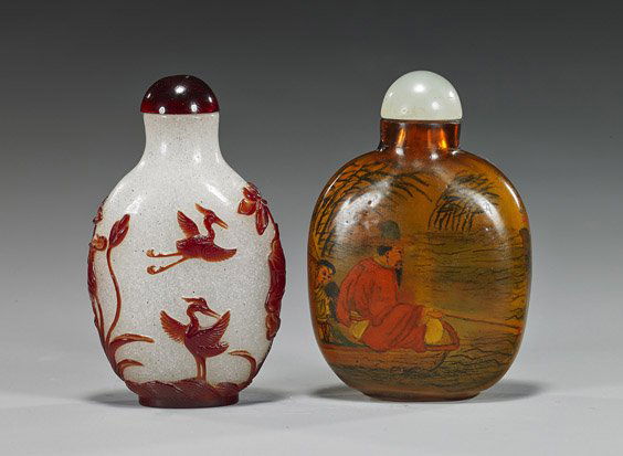 Two Various Chinese Glass Snuff Bottles: Two Various Chinese Glass Snuff BottlesTwo various Chinese glass snuff bottles: amber color with inside painted designs of boys playing in a garden, verso with a scholar and attendant in a boat, early