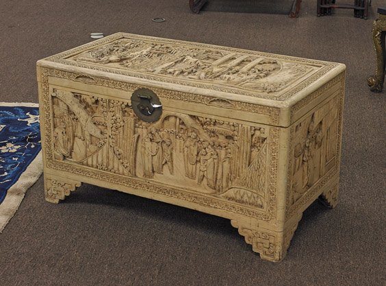 Chinese Carved Camphor Wood Chest: Chinese Carved Camphor Wood Chest Chinese very elaborately carved camphor wood chest; rectangular with high relief scenes to each side and the hinged cover, each scene depicting figures in landscapes 