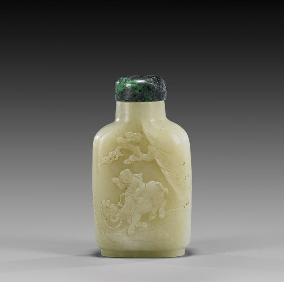 LARGE CELADON JADE SNUFF BOTTLE: LARGE CELADON JADE SNUFF BOTTLE Large and finely hollowed, whitish-celadon jade snuff bottle: of rectangular form, with design of boy on buffalo to the front and figure on horse to verso; mottled gree