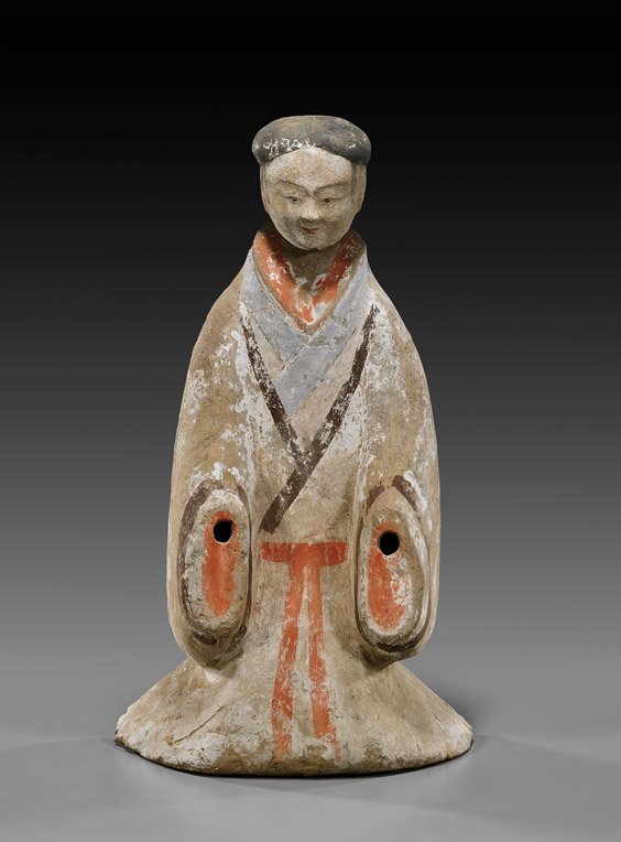 CHINESE HAN DYNASTY POTTERY FIGURE: HAN DYNASTY POTTERY KNEELING FIGURE Tall and heavy, Chinese Han Dynasty pottery kneeling figure: with long stylized sleeves; with typical separate head and with much remaining original pigments and sl