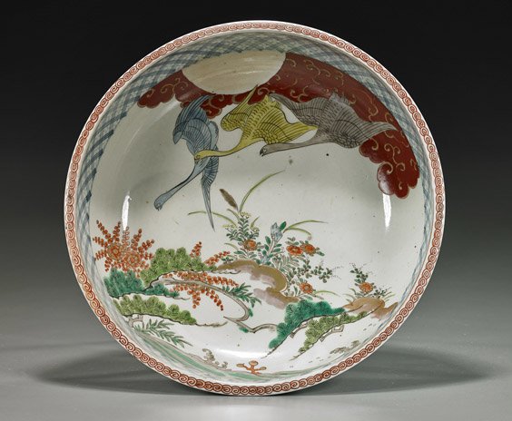 Antique Japanese Imari Porcelain Bowl: Antique Japanese Imari Porcelain Bowl Antique Japanese Imari porcelain bowl; of shallow circular form with design of colorful cranes in flight above a landscape, the exterior with cranes, pine and wav