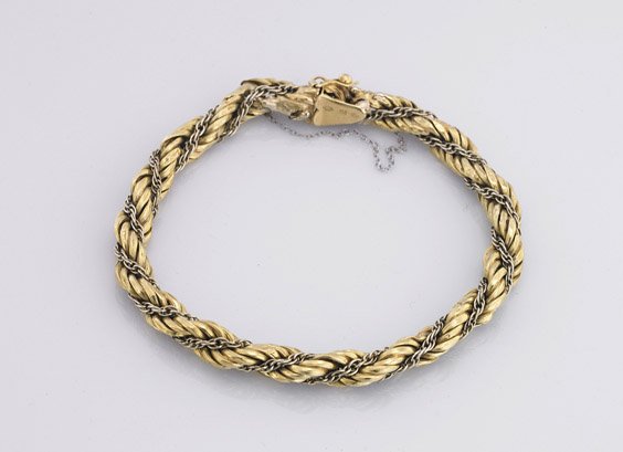 18K Yellow Gold Bracelet: 18K Yellow Gold Bracelet 18K yellow gold bracelet; of woven "rope" form with two intertwined chains and weighing 18.9g; D: 3"