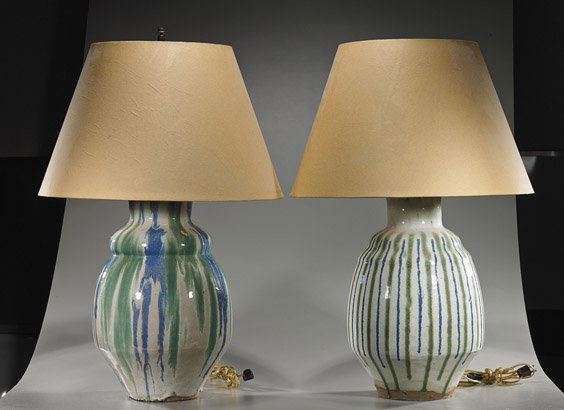Two Large Japanese Glazed Earthenware Jars: Two Large Japanese Glazed Earthenware JarsTwo large and unusual, Japanese glazed earthenware jars; each of unusual, somewhat ovoid form with blue and green "dripped" glaze (now mounted as lamps); H: 1