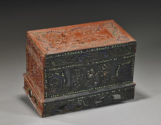 Antique Burmese Lacquer Wedding Box: Antique Burmese Lacquer Wedding Box Antique Burmese lacquer wedding box; rectangular with relief designs of scrolling foliage, praying figure to the front and back, dragon on the cover, with mirrored 