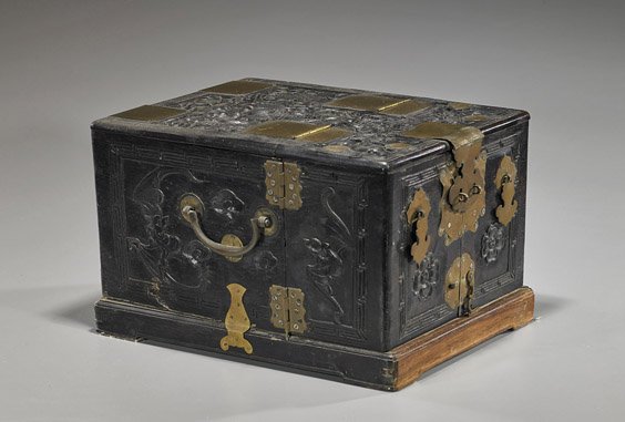 Antique Chinese Hardwood Cosmetic Box: Antique Chinese Hardwood Cosmetic Box Antique Chinese hardwood cased cosmetic box; carved with dragon design in relief to the cover, the cover hinged and with double doors to the front housing various