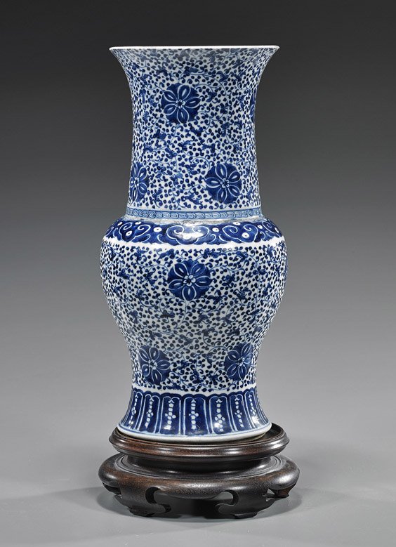 Antique Chinese Blue & White Porcelain Vase: Antique Chinese Blue & White Porcelain Vase Antique Chinese blue and white porcelain vase; of somewhat beaker form with allover floral designs, four-character mark (rim ground), 19th Century; H: 14 1/