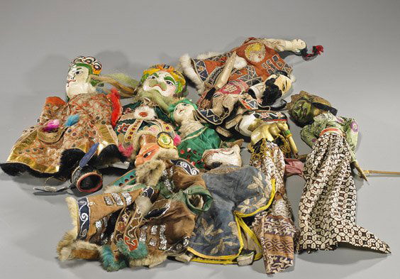 Group of Various Old Chinese Puppets: Group of Various Old Chinese PuppetsGroup of 9 old and antique Chinese puppets; mostly figures, some possibly deities and with one horse-type headed (some usual wear to fabrics and heads); L: 16" (lar