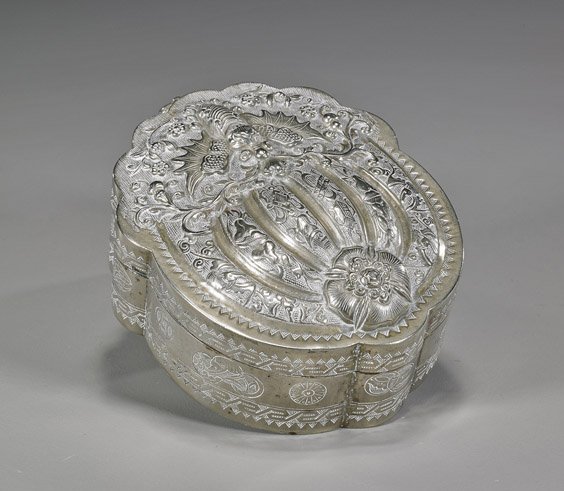 Antique Chinese Repoussé Silver Box: Antique Chinese Repoussé Silver Box Antique Chinese repoussé silver box with hinged cover; with somewhat melon-like design to the cover; and with Buddhist emblems, moth, and flowers, incised medalli