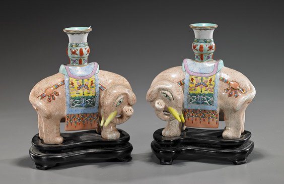 Pair Chinese Enameled Porcelain Elephants: Pair Chinese Enameled Porcelain Elephants Pair Old Chinese enameled porcelain elephants; each standing four-square, with head turned and wearing a decorative caparison and with a vase on the back of e
