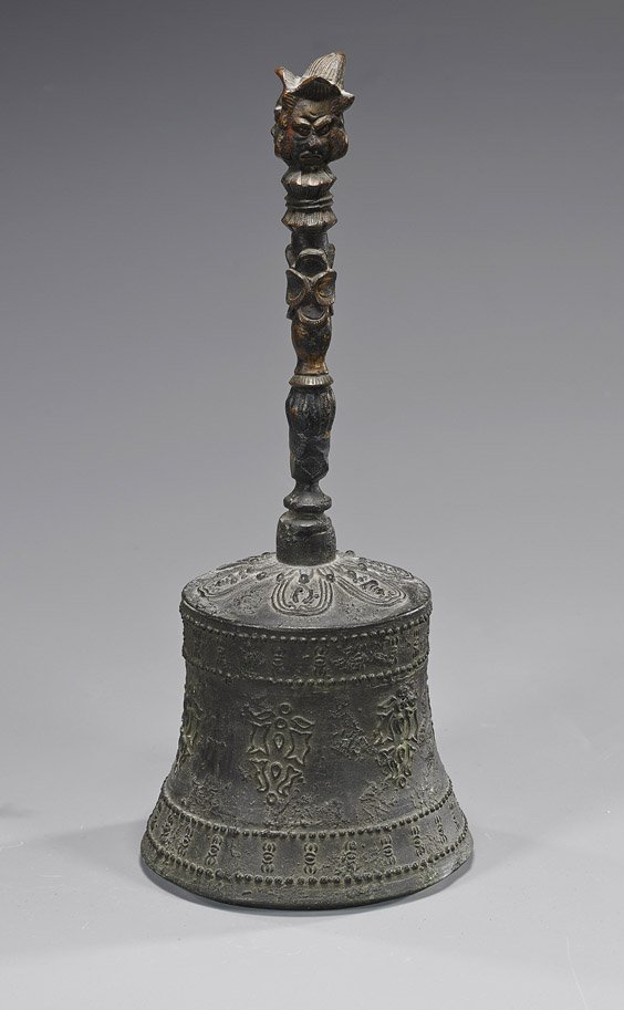 Antique Sino-Tibetan Bronze Buddhist Bell: Antique Sino-Tibetan Bronze Buddhist Bell Antique Sino-Tibetan bronze Buddhist bell; with floral-type motifs and long handle with three deity faces as finial; H: 11"; with certificate