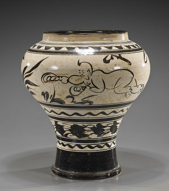 Unusual Chinese Cizhou Glazed Jar: Unusual Chinese Cizhou Glazed Jar Unusual Chinese cizhou glazed jar; of unusual form, somewhat pedestal footed and high shouldered, with design of a crawling baby boy and flowers, possibly Jin Dynasty