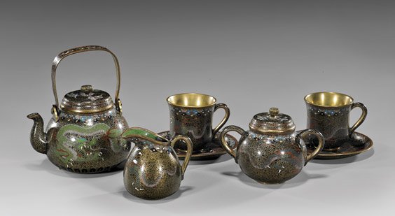 FINE JAPANESE CLOISONNÉ ENAMEL TEA SET: FINE JAPANESE CLOISONNÉ ENAMEL TEA SET Fine Japanese cloisonné enamel, seven-piece tea set of Namikawa pattern, including: teapot, two saucers and cups, sugar bowl and creamer; each featuring multi-