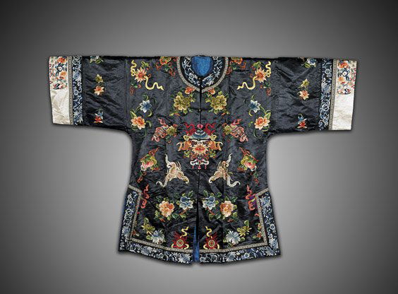 CHINESE EMBROIDERED SILK SHORT ROBE: CHINESE EMBROIDERED SILK SHORT ROBEChinese embroidered silk short robe; the vibrant colorful design centering a Buddhist parasol flanked by fish and with lotus blossom, amid butterflies, emblems and v