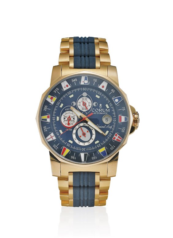 CORUM "ADMIRAL'S CUP TIDES REGATTA" WATCH: CORUM "ADMIRAL'S CUP TIDES REGATTA" WATCHRose gold Corum "Admiral's Cup Tides 44 Regatta" wristwatch: the dark blue dial with three sub-dials for moon phase, tide coefficients/indication, and date win