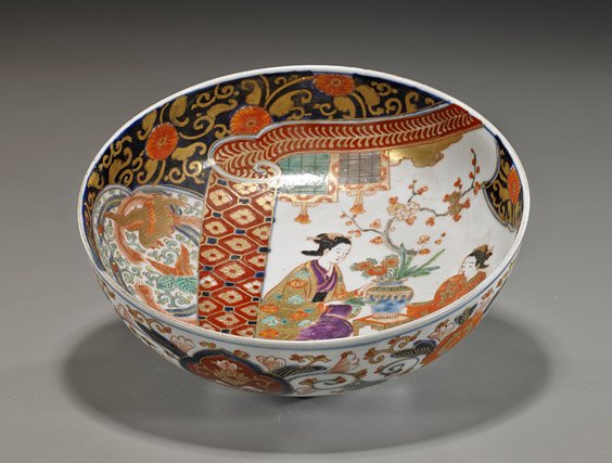 Antique Japanese Imari Porcelain Bowl: Antique Japanese Imari Porcelain Bowl Antique Japanese Imari porcelain bowl; circular: the interior with scene of a beauty and attendant arranging flowers and with dragon and phoneix motifs; the exter