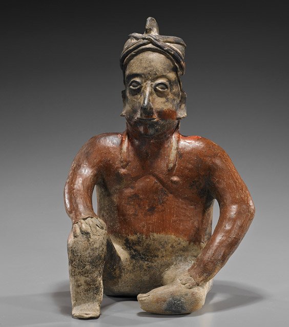 Pre-Columbian Pottery Seated Male Figure: Pre-Columbian Pottery Seated Male Figure West coast Mexican, Pre-Columbian pottery male figure; seated with one knee raised and hands resting on his knees, naturalistic modeled face and wearing a head