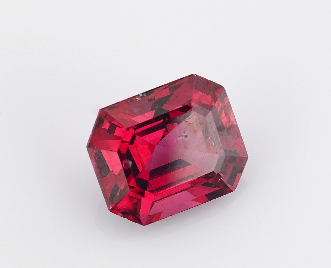 Two Spinel Gemstones: Red & Pink: Two Spinel Gemstones: Red & PinkTwo faceted Spinel: one red and emerald-cut, weighing 3.66 Cts.; the other pink and oval-cut, weighing 1.68 Cts.; L: 3/8" (larger), Provenance: Sold to benefit the AS &
