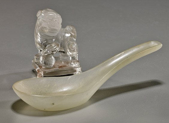 Antique Rock Crystal Seal & Bowenite Spoon: Antique Rock Crystal Seal & Bowenite SpoonAntique Chinese carved rock crystal (quartz) seal; square form surmounted by a standing lion with one paw resting on a ball; together with an old translucent
