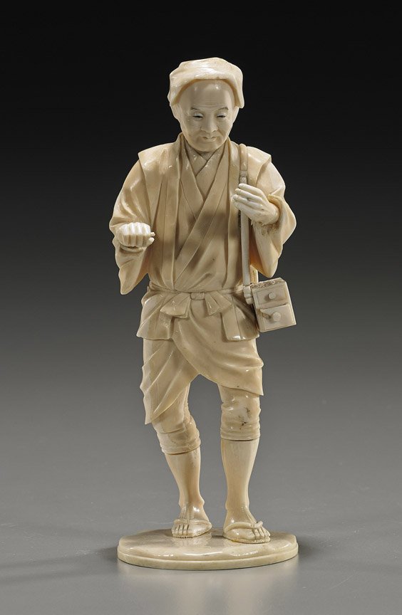 Antique Carved Ivory Okimono Male Figure: Antique Carved Ivory Okimono Male FigureAntique sectional Japanese carved ivory okimono; of a man walking and carrying a box on his shoulder (repaired hand and missing pieces), Circa 1900; H: 7 1/4";