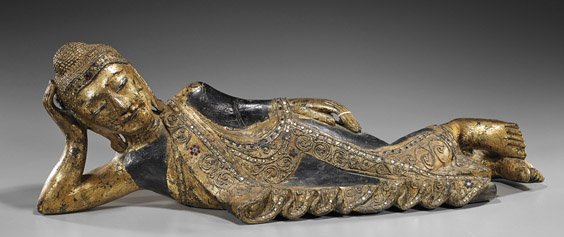 Antique Southeast Asian Reclining Buddha: Antique Southeast Asian Reclining Buddha Large and antique, Southeast Asian, probably Thai, lacquer Buddhist attendant; reclining with his head resting on one hand, wearing long elaborate robes, gold 