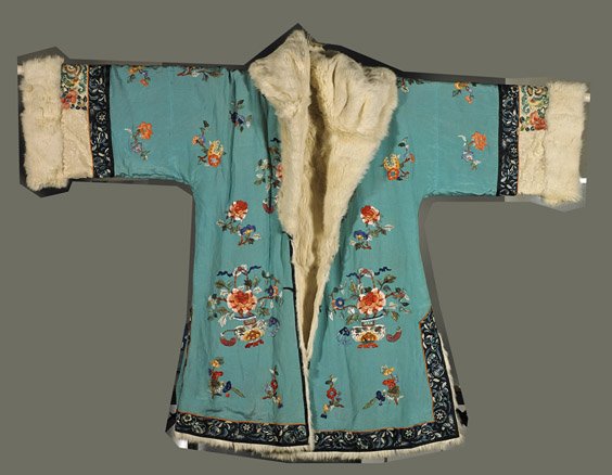 Chinese Fur-Lined & Embroidered Silk Coat: Chinese Fur-Lined & Embroidered Silk Coat Early 20th Century, Chinese fur-lined, possibly ermine, and embroidered silk coat; with satin stitch florals and precious vessels on bright blue ground (some 