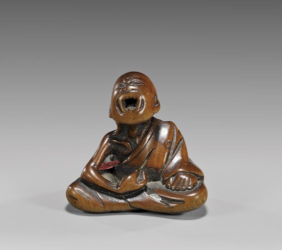 ANTIQUE WOOD NETSUKE: Sneezer: ANTIQUE WOOD NETSUKE: Sneezer Well carved, antique boxwood netsuke; of a seated sneezer, signed, 19th Century 木製根付