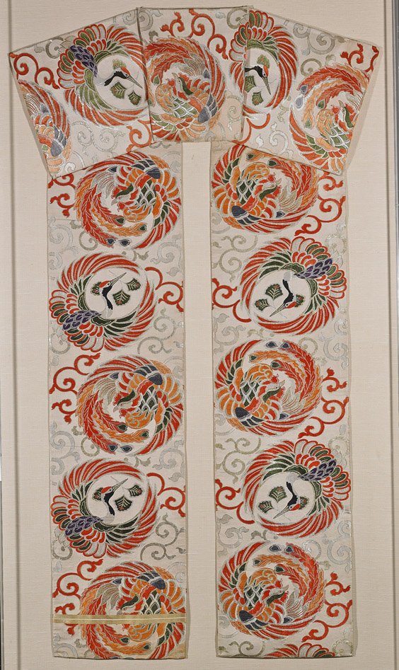 Mounted Japanese Obi with Cranes: Mounted Japanese Obi with Cranes Mounted Japanese silk Obi; with design of colorful crane and phoenix medallions; L: 57", inside lucite shadow box frame
