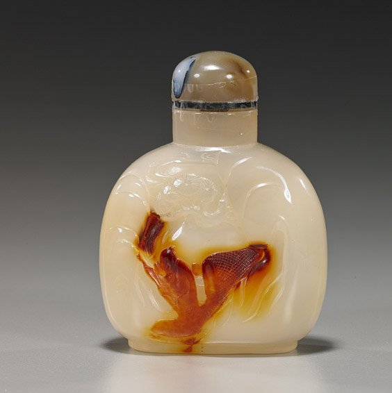 Chinese Shadow Agate Snuff Bottle: Chinese Shadow Agate Snuff Bottle Well carved and finely hollowed, Chinese shadow agate snuff bottle: with design of a figure in a boat and pine above; bright carnelian color on a creamy white ground,