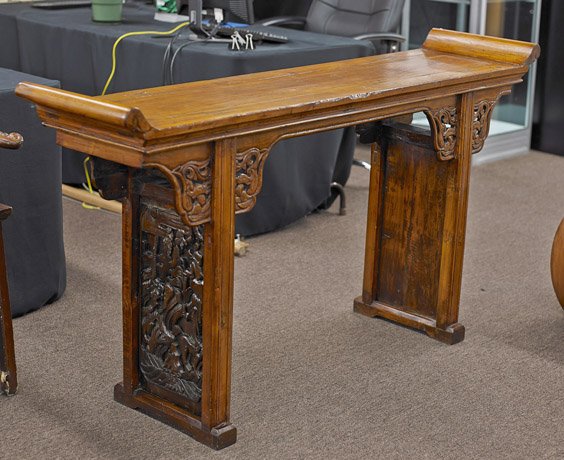 Antique Chinese Carved Elmwood Altar Table: Antique Chinese Carved Elmwood Altar Table Antique Chinese elmwood altar table; in Ming style, with openwork carved panels at the apron and the side with high relief panels depicting animals in a moun