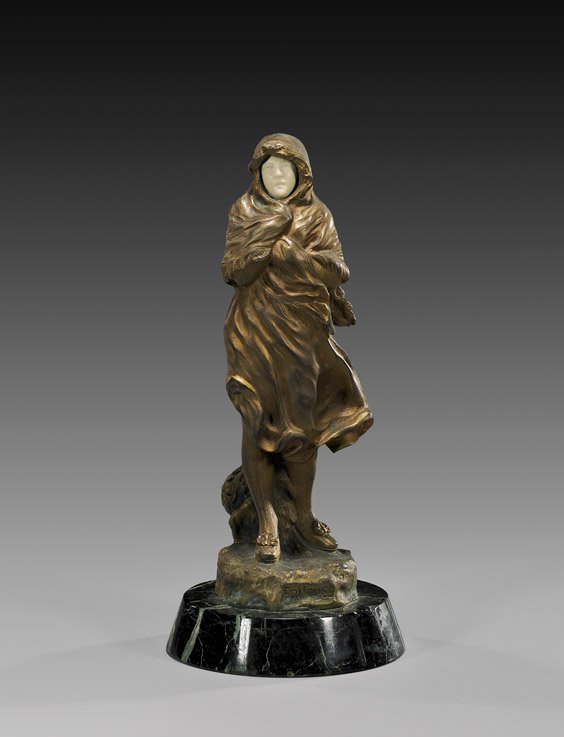 FRENCH BRONZE FIGURE BY J. GARNIER: FRENCH BRONZE FIGURE BY J. GARNIEREarly 20th Century, French Art Nouveau bronze figure by Jean Garnier (1853-1910); of a girl windblown and holding a wrap tightly around her carved ivory face, titled