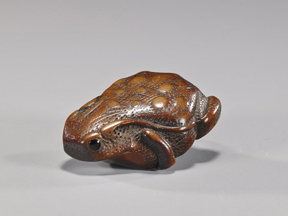 Antique Carved Wood Netsuke: Frog: Antique Carved Wood Netsuke: FrogAntique carved wood netsuke; in the form of a frog, with big belly and inlaid eyes, 19th Century; Provenance EX: Raymond Bushell Collection