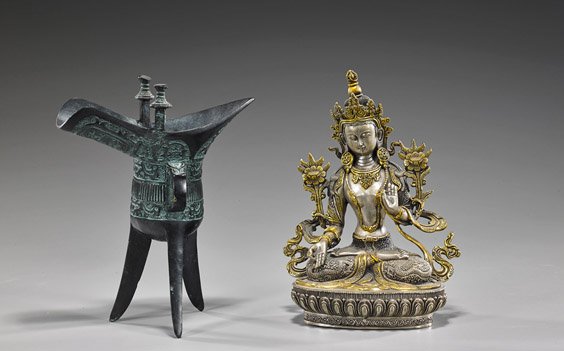 Two Various Bronzes: Tripod Vessel & Deity: Two Various Bronzes: Tripod Vessel & Deity Two various bronzes: Sino-Tibetan or Nepalese parcel-gilt and parcel-silvered seated deity on a lotus base, with hands in mudra and holding blossoms; togethe