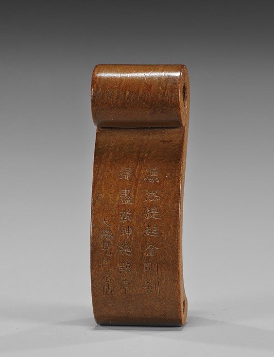 Antique Carved Wood Netsuke: Scroll: Antique Carved Wood Netsuke: Scroll Antique carved wood netsuke; in the form of a scroll, with a long incised inscription/poem, 19th Century; Provenance: Raymond Bushell Collection