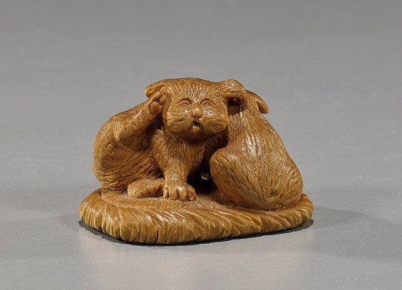 Rare Carved Wood Okimono: Two Puppies: Rare Carved Wood Okimono: Two Puppies Carved wood netsuke-sized okimono; depicting two cuddling puppies; signed by Alexander Derkachenko (b. 1964) dated '95; President of the Ukraine Netsuke Society
