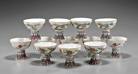Set of 12 Famille Rose Porcelain Stem Bowls: Set of 12 Famille Rose Porcelain Stem Bowls Set of twelve early 20th Century, Chinese Famille Rose porcelain stem bowls; each with floral designs and Buddhist emblem; D: 3. 1/2" (each)