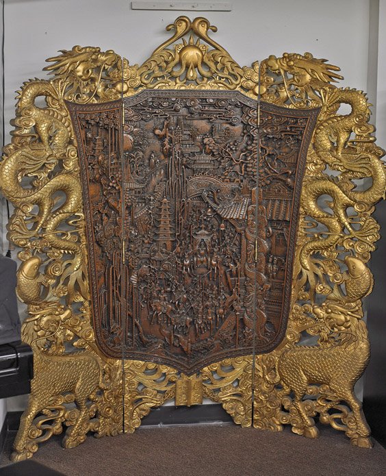 Unusual Chinese 3-Panel Wood Panel: Unusual Chinese 3-Panel Wood Panel Very elaborately carved and extremely heavy, Chinese 3-panel screen; the center and part of the side panels decorated in high relief of numerous figures, buildings, 