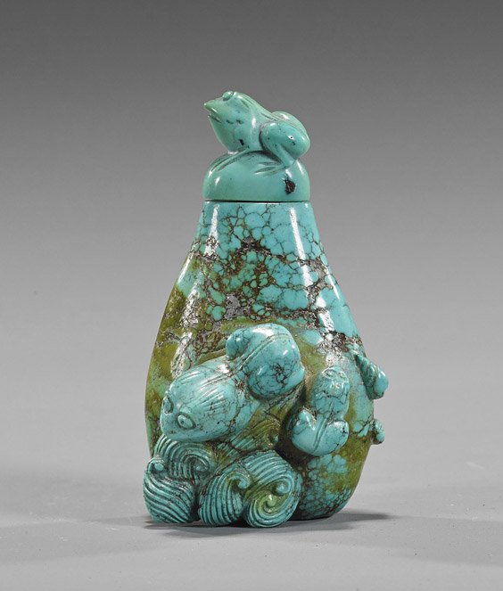 Old Carved Turquoise Snuff Bottle: Old Carved Turquoise Snuff Bottle Old Chinese carved turquoise snuff bottle; of sloped form, the front with frogs and seashells with waves in high relief, matching stopper (natural inclusions, minor w