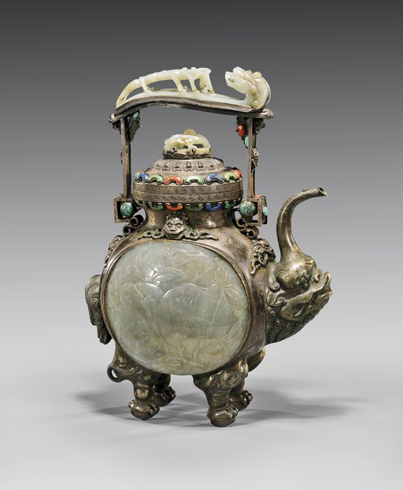 OLD CHINESE SILVER MOUNTED EWER: 銀鑲玉壽紋螭龍帶鉤柄壺 OLD CHINESE SILVER MOUNTED EWER Very unusual, old Chinese silver mounted ewer; in somewhat Mongolian animal-for