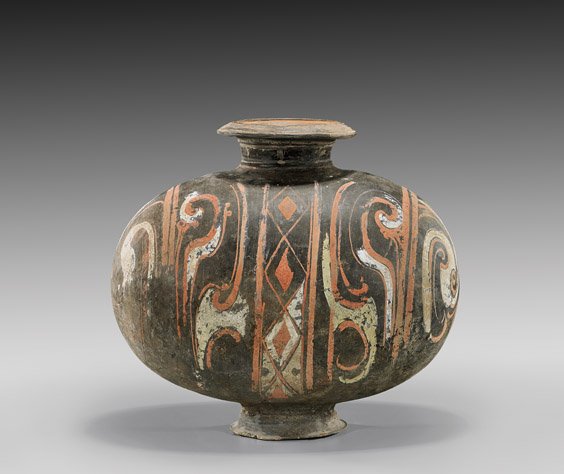 HAN DYNASTY PAINTED POTTERY COCOON JAR: 陶加彩幾何紋罐 HAN DYNASTY PAINTED POTTERY COCOON JAR Very elaborately painted, Chinese Han Dynasty, pottery "cocoon" jar: of horizontal "egg" form, on a smal