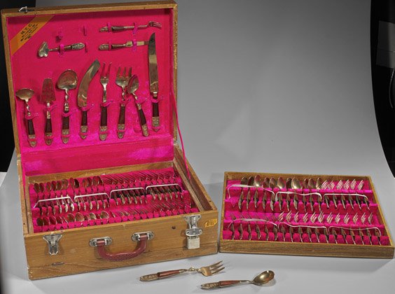 Box Set of 144-Piece Thai Brass Flatware: Box Set of 144-Piece Thai Brass Flatware Box of Thai brass and wood flatware, stamped with Siam and a Bodhisattva to each end, service for twelve including: salad, dinner, dessert, soup untensils, alo