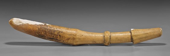 Rare Primitive Carved Ivory Club: Rare Primitive Carved Ivory Club Extremely rare and antique, primitive carved ivory club; heavily patinated, possibly fossil ivory (chips and repair); L: 19"; Provenance: by repute purchased from LA C