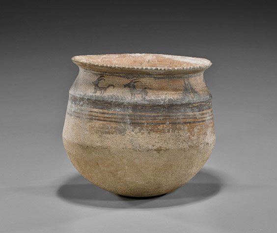 Ancient Middle Easter Pottery Jar: Horned Animals: Ancient Middle Easter Pottery Jar: Horned Animals Ancient Middle Eastern pottery jar; of rounded bottom and flared lip, with black painted designs of horned animals above band of concentric circles (c