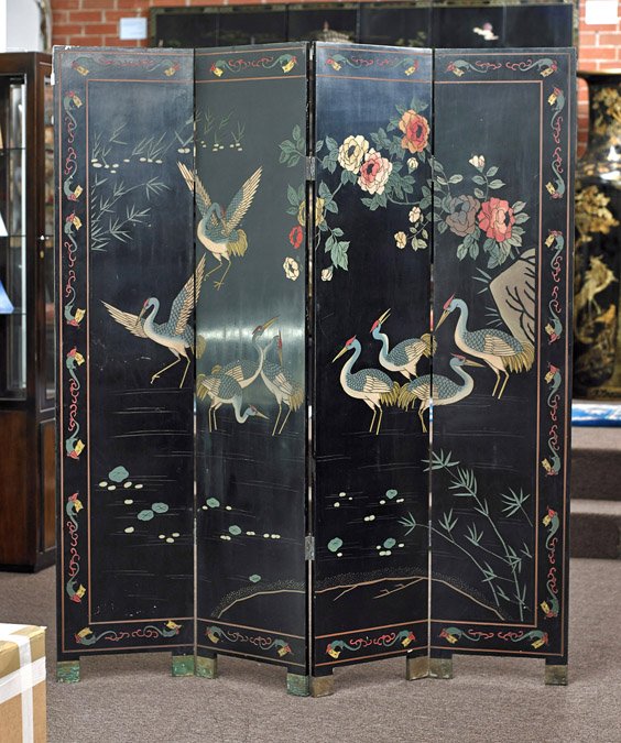 Chinese Four-Panel Lacquer Screen: Cranes: Chinese Four-Panel Lacquer Screen: Cranes Chinese four-panel Coromandel carved lacquer screen: depicting many cranes bathing in a pond with flowers all around, a stylized phoenix-like border, bamboo a